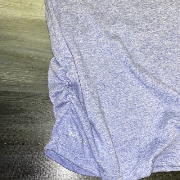 Nike short sleeved dri-fit women’s XL fits like a large. - Picture 3 of 9